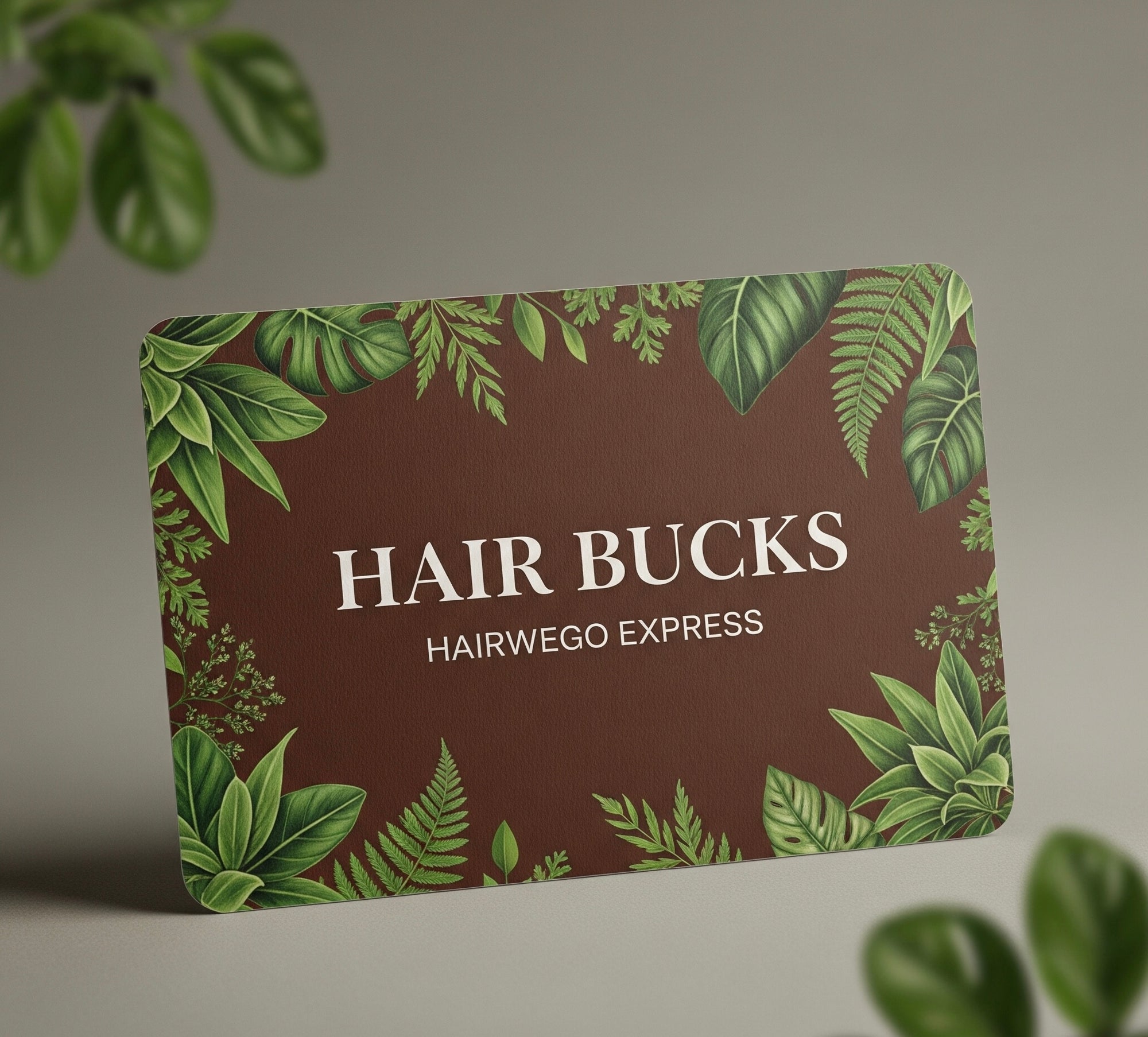 Gift card with green leaf design and text 'Hair Bucks' from Hairwego Express